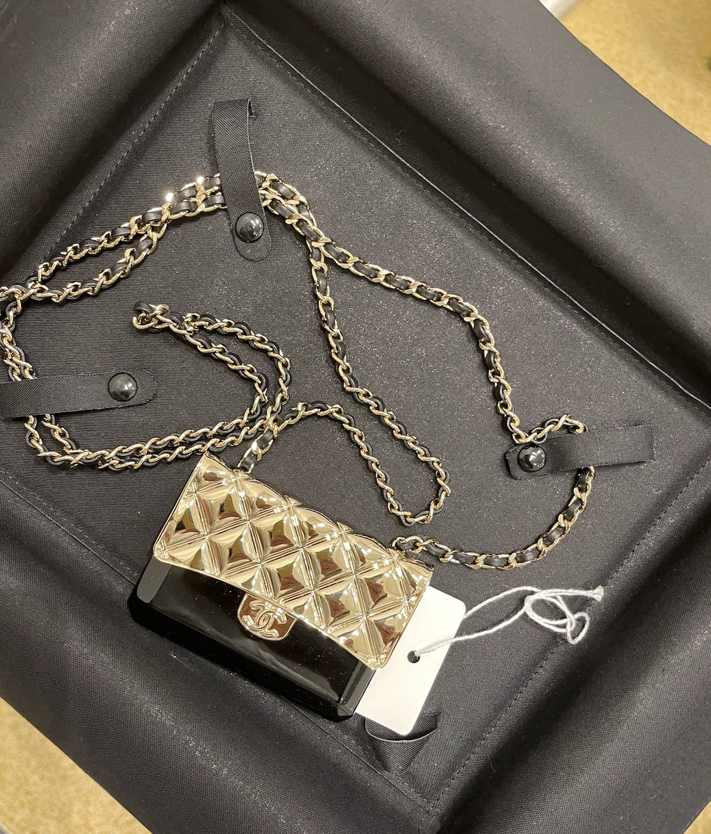 black chanel bag with gold chain necklace