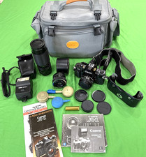 Canon A-1 SLR 35mm Film Camera Bundle 3 Lenses Bag Strap and Flash Manuals Etc.