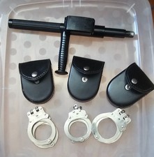 2 Hinged 1 chain Handcuff w/ 3 cases 1 collapsible pr24
