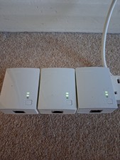 TP-LINK AV500 Powerline Adapter Starter Kit (TL-PA4010KIT) with extra adapter.