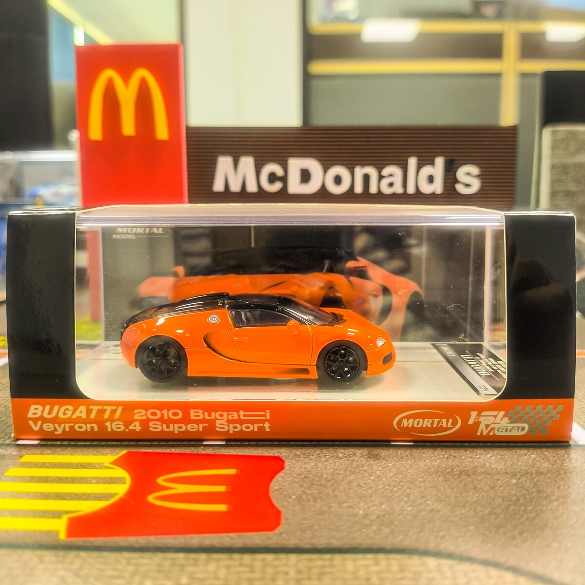 Mortal 1/64 Scale Bugatti Veyron 16.4 Super Sport Orange Car