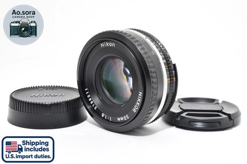 Foto Dotti | Nikon Nikkor AI-S 50mm f1.8 Series E "Pancake" con Tappi e Foto Dotti | Nikon Nikkor AI-S 50mm f1.8 Series E "Pancake" con Tappi e