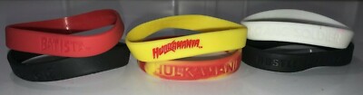 WWE WRESTLING 12X SILICONE WRIST BANDS- BATISTA, HULK HOGAN, REY, CENA