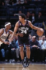Point guard Andre Miller Cleveland Cavaliers dribbles the ball at- 2002 Photo