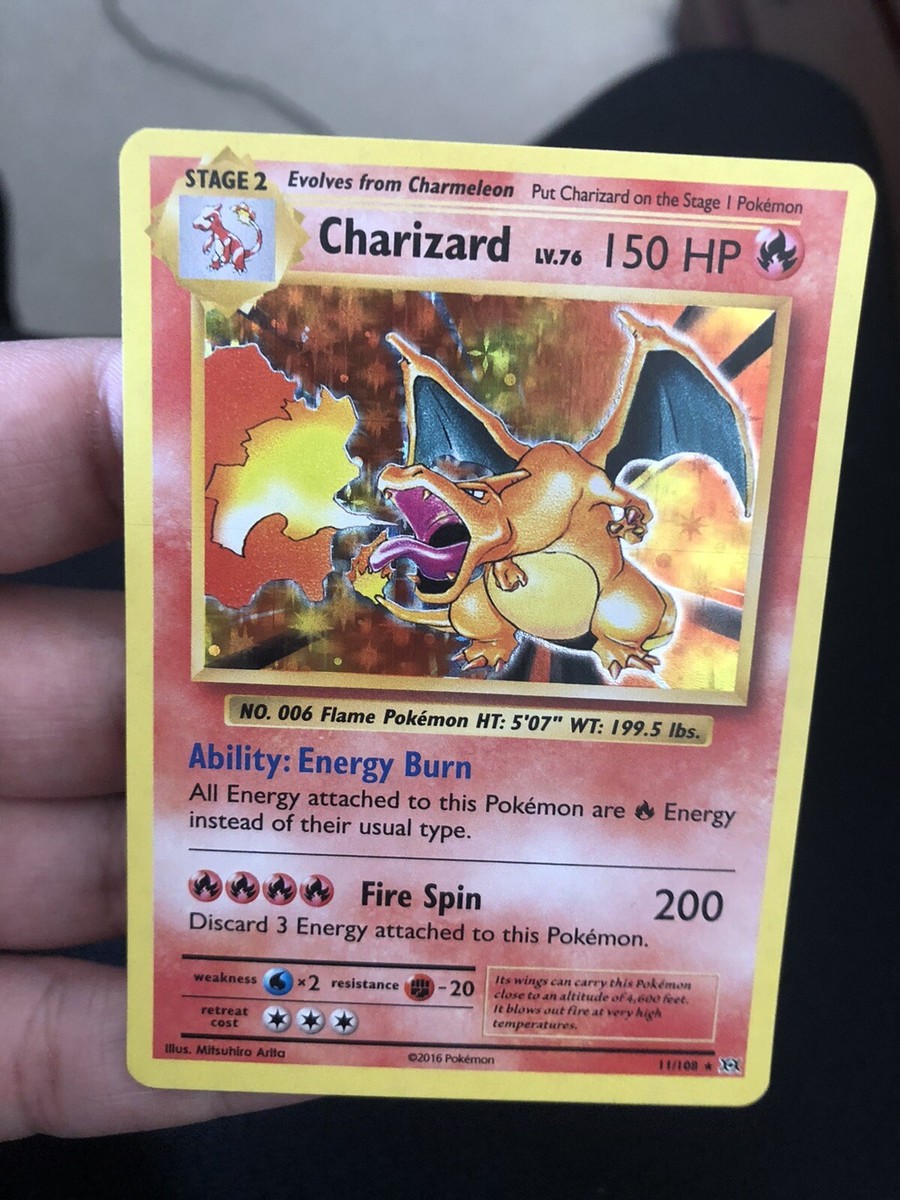 charizard pokemon card 11/108 holo Evolutions Reverse CGC 8 Holo is a 2016 reprint of the original base set Charizard Charizard 11/108 (Holo) - XY