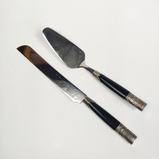 Juego de cuchillos y espátulas para pasteles serie Aria-Black de acero inoxidable ornamentado INOX EME Italia