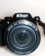 Nikon COOLPIX P90 Digital Camera 12.1 MP 24X Zoom With Charger 2 batteries Strap