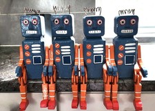 4 Vintage Painted Wooden Robots. Articulated. 33cm. refxced.