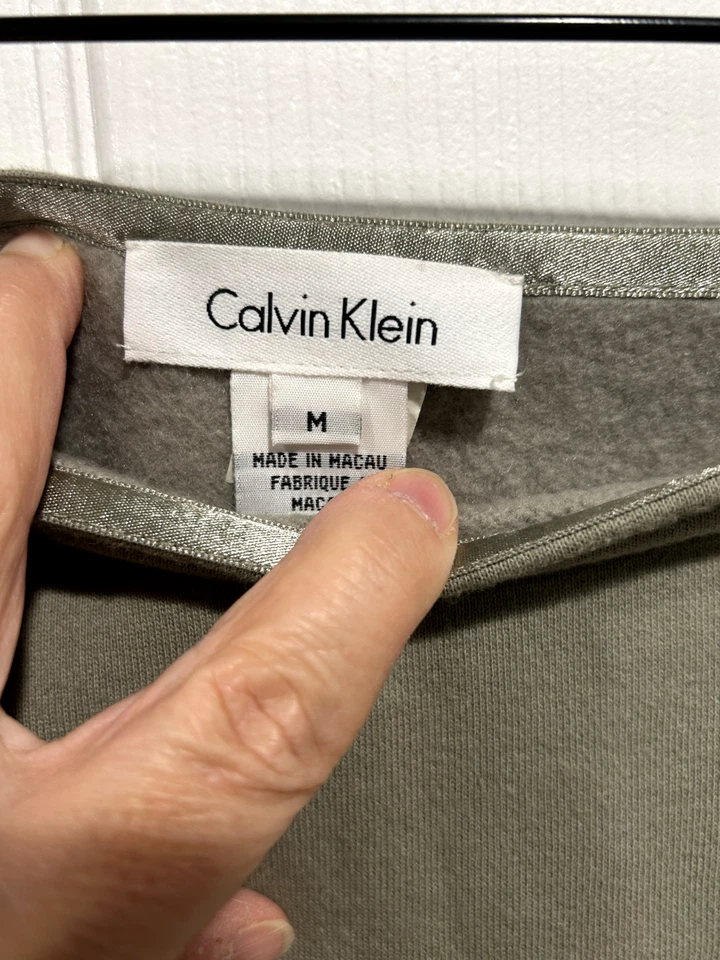 Falda polar Calvin Klein talla mediana línea A rodilla cremallera lateral frente plano cálido oliva Foto 4 de 4