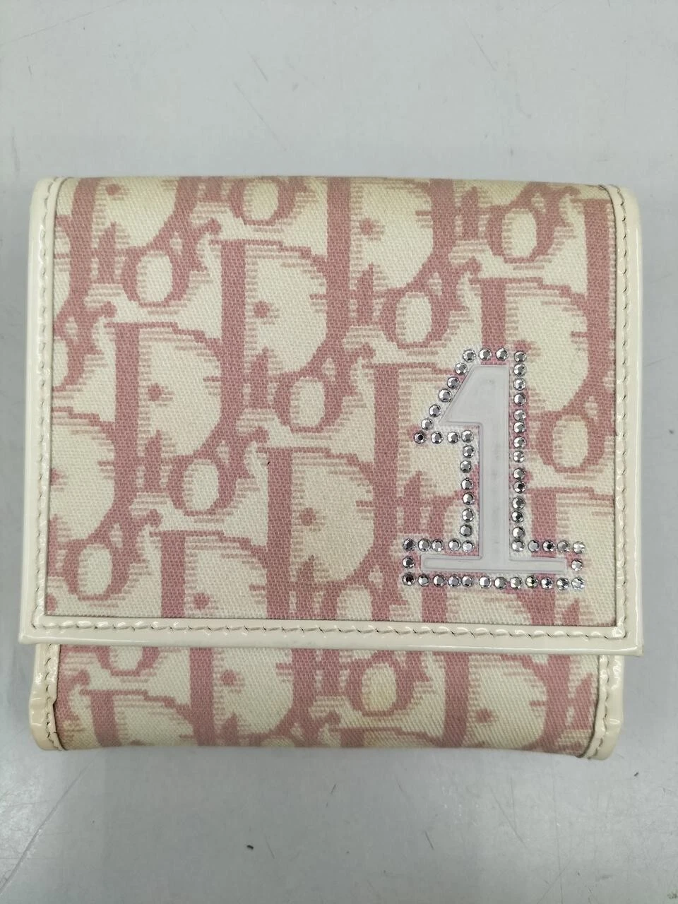 Portefeuille Christian Dior bi pli trotteur rose n°1 femme du Japon