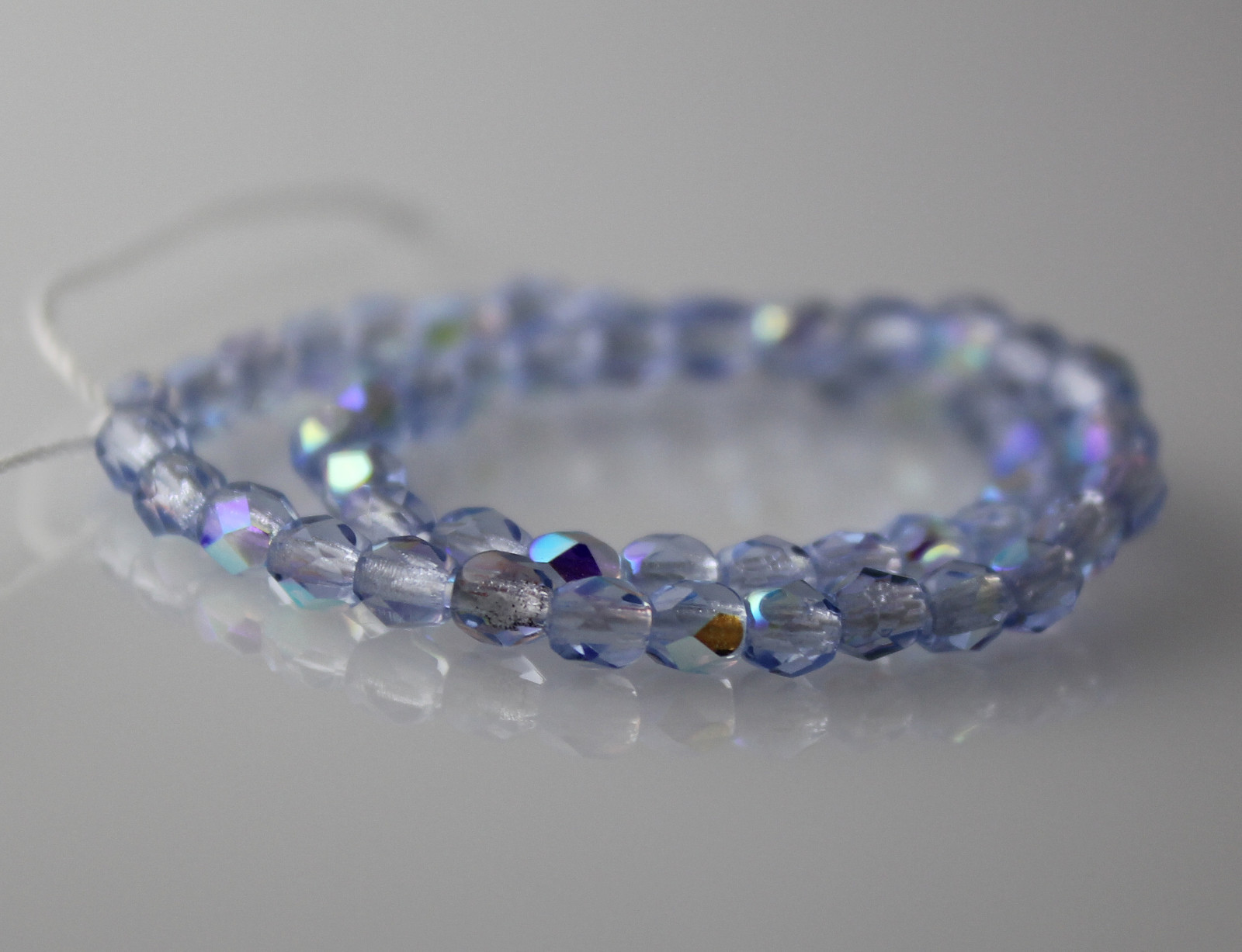 Light Sapphire Blue AB - 50 3mm Faceted Round Fire Polish Cz