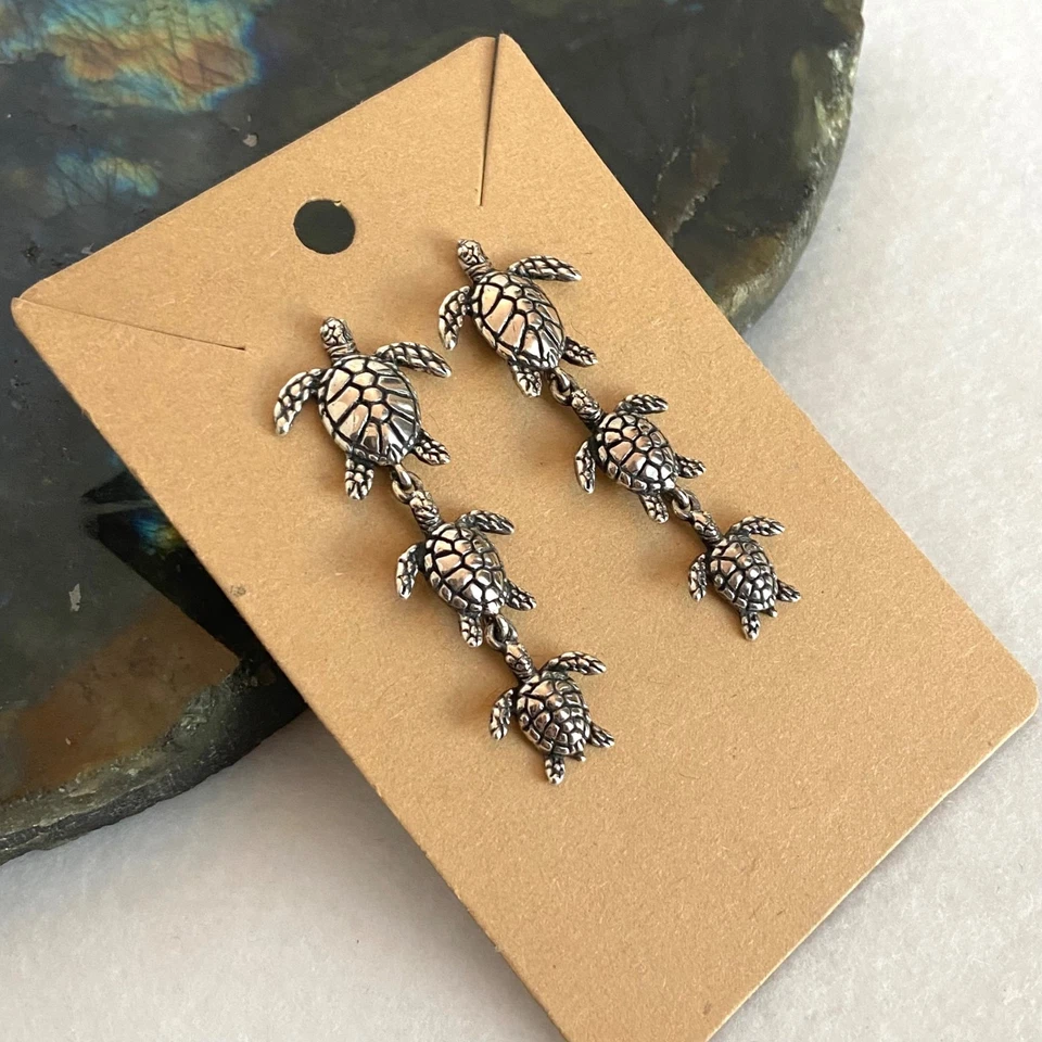 Pendientes colgantes trío tortugas marinas dimensionales plata esterlina 925 Kabana de colección Foto 2 de 4