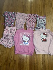 Huge hello kitty Clothes Lot . Sizes Run In Small Medium And Large . Pre Owned
