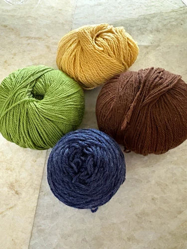 Lot of four4.7 oz Worsted Weight #4 Wool donuts for Crochet Knitting Green/Beige - product listing photo
