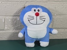Peluche imbottito Doraemon 7,5" blu grande sorriso usato mancano etichette