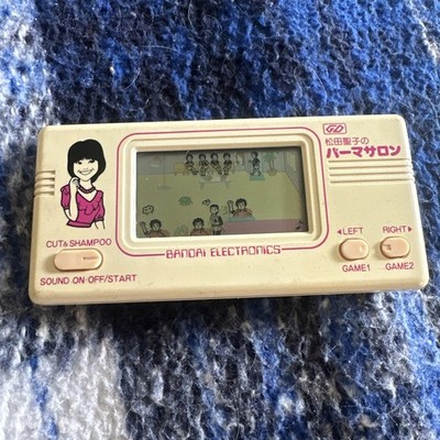 BANDAI Electronic vintage game.  CUT and SHAMPOO Works Perfectly New Batteries.