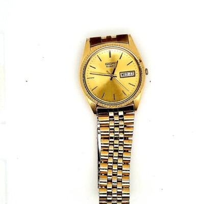 AUTHENTIC SEIKO QUARTZ GOLDEN DIAL DAY DATE MEN'S 7N43-8119