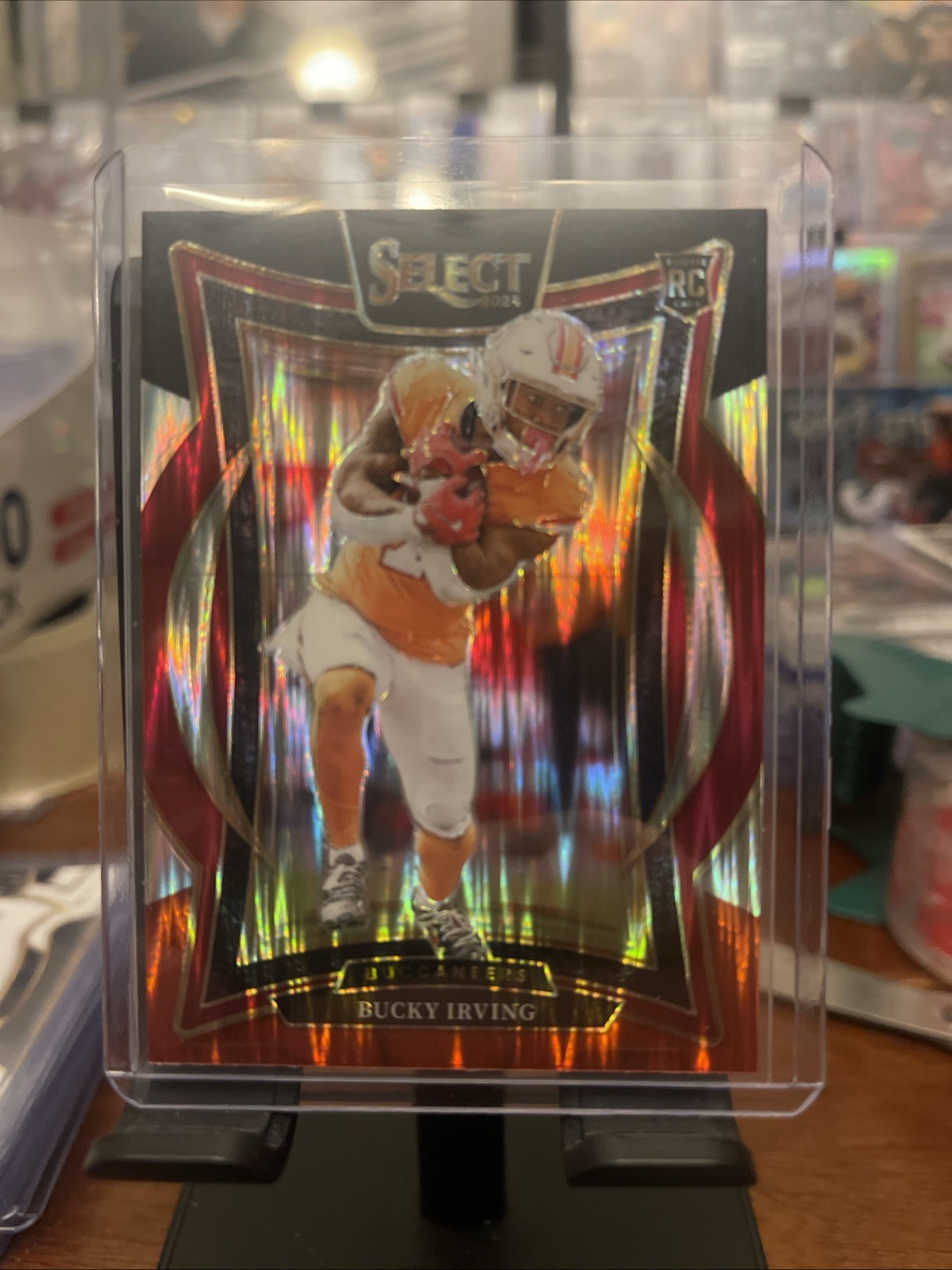 2024 Panini Select - Concourse Bucky Irving #4 Black & Orange Shock Prizm (RC)