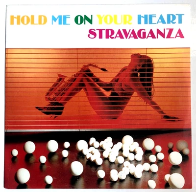 STRAVAGANZA 45 Single "Hold Me On Your Heart" 1986 NM Italo Disco - Bild 1 von 3