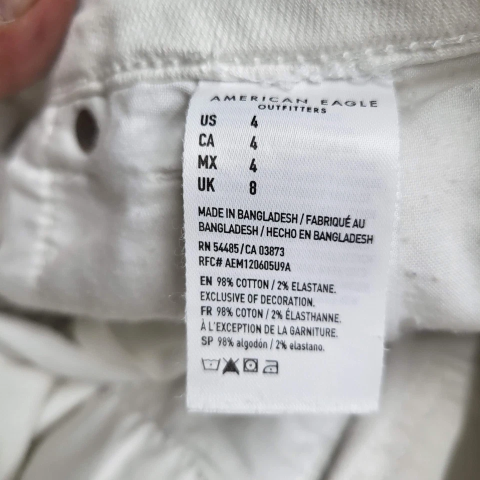Pantalones cortos American Eagle para mujer 4 blancos denim desgastados súper elásticos dobladillo deshilachado Foto 4 de 4