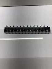 terminal barrier block, also known as a bus bar or barrier strip.