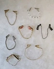 Vintage / Antique Womens Coat/ Dres clip Lot of 7. 3 Patent Pending, Milk glass/