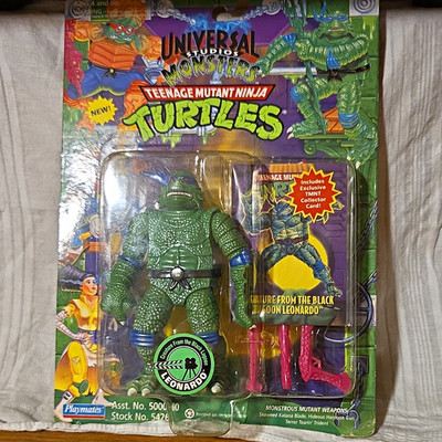 Playmates TMNT Universal Studios Monsters Leonardo Figure w/ Weapons, Card