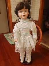 Seymour Mann Connoisseur Collection Black Hair/ Green eye Lt Blue Dress