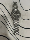 seiko men’s black face silver band watch vintage with dates