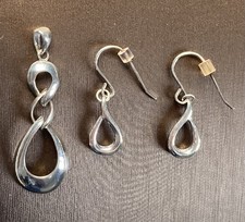 Sterling Silver 925 Infinity Style Pendant and matching dangle Earrings