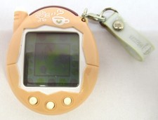 BANDAI Tamagotchi Plus Keitai Kaitsuu Milk Tea From Japan A1525