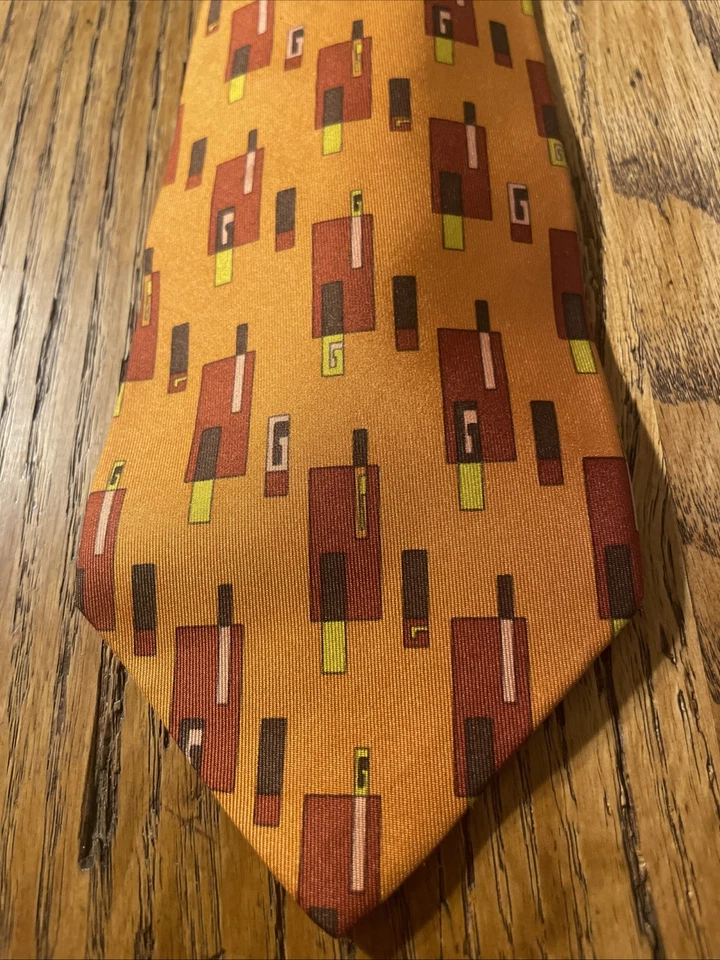 Corbata de seda vintage usada en excelente estado Gucci geométrica arte pop logotipo G hecha en Italia Foto 2 de 4