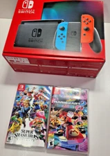 NINTENDO SWITCH JOY CON COMPLETE 32GB W/ MARIO KART DELUXE SUPER SMASH BROS ULT