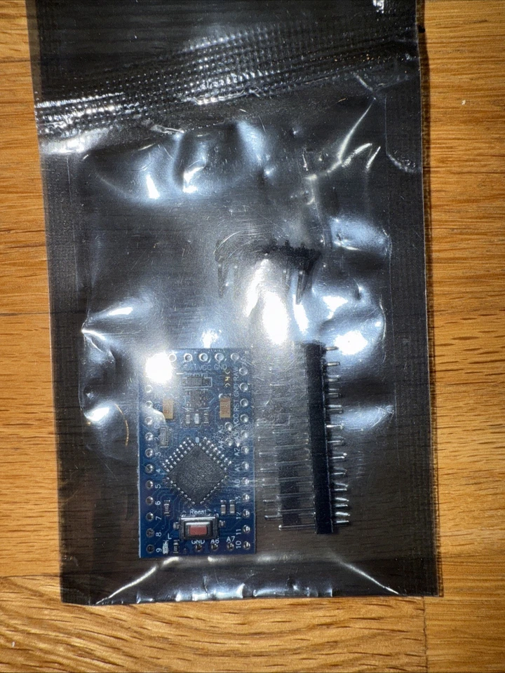 Placa de desarrollo Pro Mini ATmega328P 5V 16MHz para Arduino con cabezales Pin Foto 2 de 4