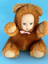 Vintage Girl Porcelain Faced Doll Wearing Teddy Bear Outfit 6” Tall READ DESC
