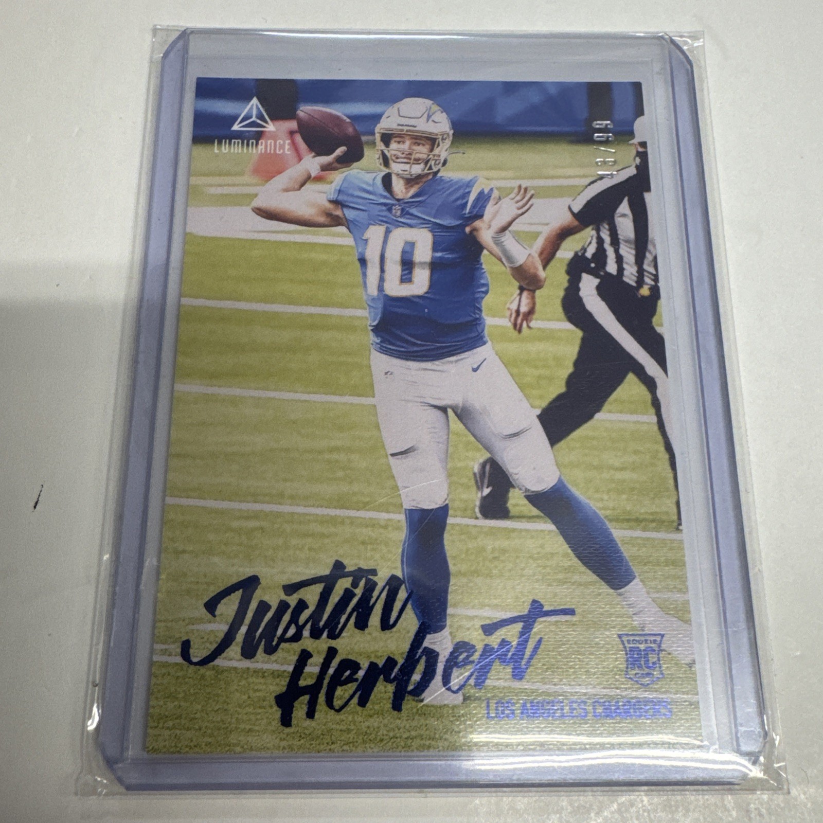 2020 Panini Chronicles Luminance #203 Justin Herbert Blue /99 Rookie Card