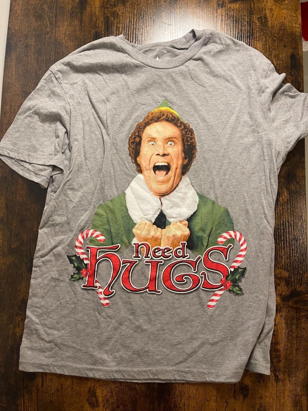 W651 Elf Movie TShirt Womens Large Need Hugs Santa Gray Will Ferrell