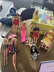 Mattel Barbie Dolls, includes a Barbie tote box, clothes & A Dorothy Hamill doll