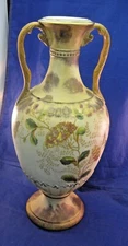 TALL TWO HANDLED POTTERY VASE - FLORAL DECORATION & EMBOSSED DESIGN 