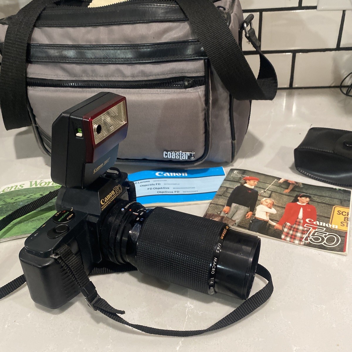 【完動未確認】Canon T50＋FDレンズ＋244Tフラッシュ 完動未確認】Canon T50＋FDレンズ＋244Tフラッシュ - メルカリ