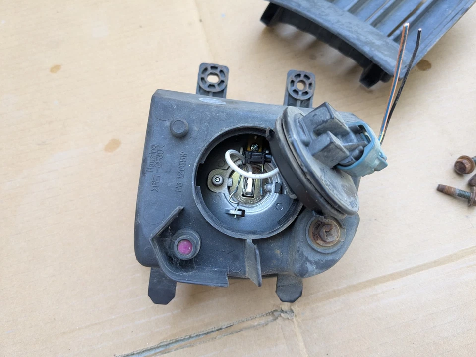 99-04 Nissan Pathfinder lâmpada de farol de neblina passageiro e motorista original do fabricante - Imagem 4 de 4