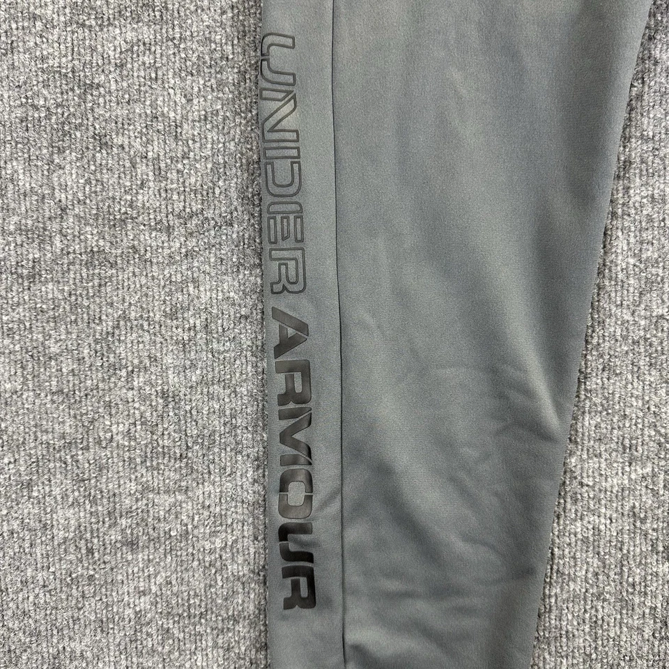 Pantalones deportivos Under Armour para jóvenes niños grandes grises sueltos Foto 3 de 4