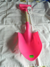pink childs spade with wooden shank 