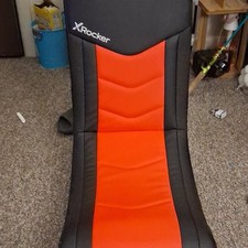 X Rocker Floor Gaming Chair Black/Red Faux Leather Foldaway 23x10x16 in