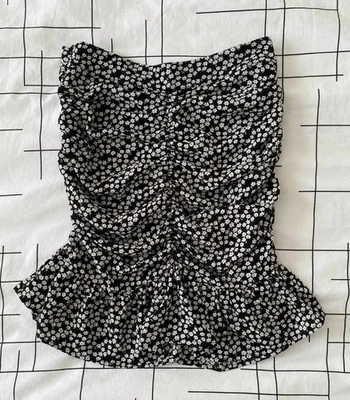 Jupe courte femme noir petites fleurs blanches Taille XS (34) - Photo 1/4