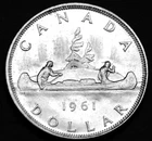 1961 $1 silver coin that is AU and looks great