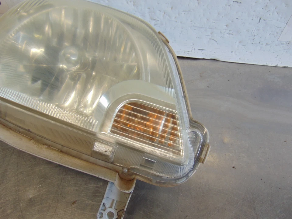 Faro derecho conductor 3 puertas Daihatsu Charade L250 04-07 Foto 3 de 4