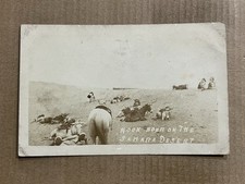 Postcard RPPC Africa Sahara Desert Men Resting In Sand Noon Hour Horse Donkey