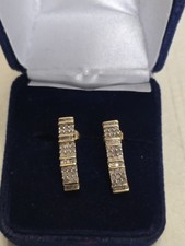 10k Yellow and White Gold earrings with small Diamonds
