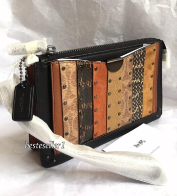 dreamer wristlet in signature canvas